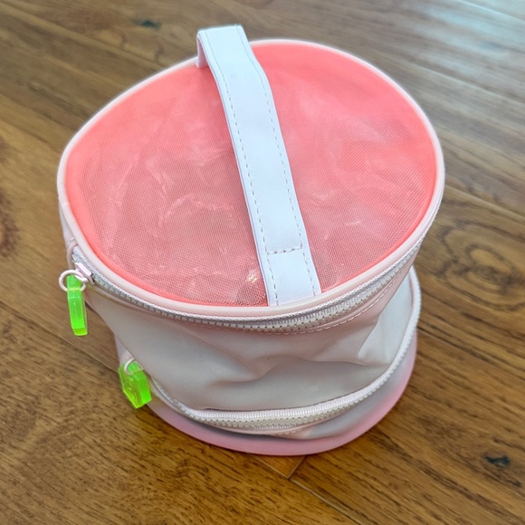 Drunk Elephant Handbags - Drunk Elephant toiletry bag round mesh pink